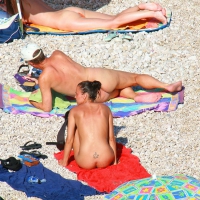 Ula FKK Sexy brunette on a nude beach topless, bottomless and with blue thong 0025.jpg