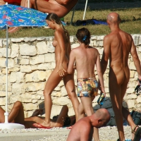 Two cute nudist girls showering completely naked on a hot day at the beach 0021.jpg