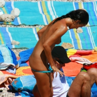 Ula FKK Sexy brunette on a nude beach topless, bottomless and with blue thong 0040.jpg