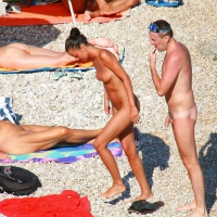 Ula FKK Sexy brunette on a nude beach topless, bottomless and with blue thong 0021.jpg