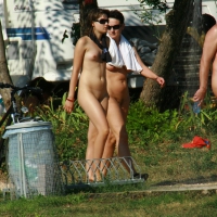 Two cute nudist girls showering completely naked on a hot day at the beach 0022.jpg