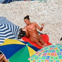 Ula FKK Sexy brunette on a nude beach topless, bottomless and with blue thong 0012.jpg
