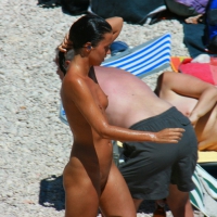 Ula FKK Sexy brunette on a nude beach topless, bottomless and with blue thong 0034.jpg