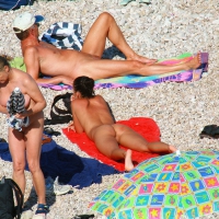 Ula FKK Sexy brunette on a nude beach topless, bottomless and with blue thong 0015.jpg