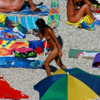 Ula FKK Sexy brunette on a nude beach topless, bottomless and with blue thong 0066.jpg