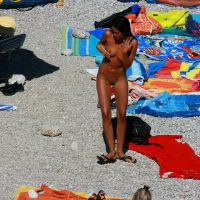 Ula FKK Sexy brunette on a nude beach topless, bottomless and with blue thong 0068.jpg