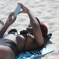 Puffy black nip slip on beach IMG_7987.jpg