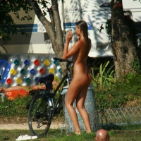 Two cute nudist girls showering completely naked on a hot day at the beach 0014.jpg