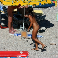 Ula FKK Sexy brunette on a nude beach topless, bottomless and with blue thong 0069.jpg