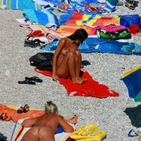 Ula FKK Sexy brunette on a nude beach topless, bottomless and with blue thong 0076.jpg
