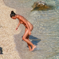 Ula FKK Sexy brunette on a nude beach topless, bottomless and with blue thong 0019.jpg