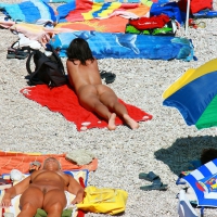 Ula FKK Sexy brunette on a nude beach topless, bottomless and with blue thong 0046.jpg