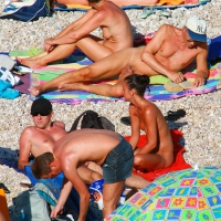 Ula FKK Sexy brunette on a nude beach topless, bottomless and with blue thong 0028.jpg
