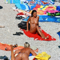 Ula FKK Sexy brunette on a nude beach topless, bottomless and with blue thong 0077.jpg
