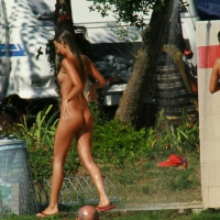 Two cute nudist girls showering completely naked on a hot day at the beach 0013.jpg