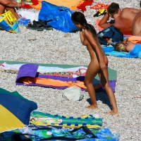 Ula FKK Sexy brunette on a nude beach topless, bottomless and with blue thong 0065.jpg