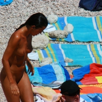Ula FKK Sexy brunette on a nude beach topless, bottomless and with blue thong 0035.jpg
