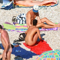 Ula FKK Sexy brunette on a nude beach topless, bottomless and with blue thong 0024.jpg