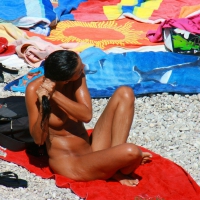 Ula FKK Sexy brunette on a nude beach topless, bottomless and with blue thong 0054.jpg