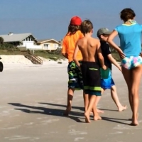 Skinny bikini teen on the beach in a blue top 44492401bzd.jpg
