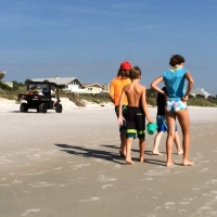 Skinny bikini teen on the beach in a blue top 44492402BNY.jpg