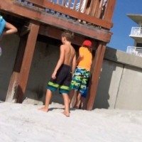 Skinny bikini teen on the beach in a blue top 44492408Ysb.jpg