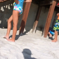 Skinny bikini teen on the beach in a blue top 44492412swP.jpg