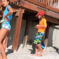 Skinny bikini teen on the beach in a blue top 44492414Wur.jpg