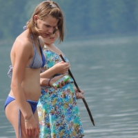 Skinny teen having fun in her little England bikini 38686279tkZ.jpg