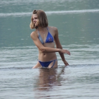 Skinny teen having fun in her little England bikini 38686364AlR.jpg