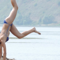 Skinny teen having fun in her little England bikini 38686387MCH.jpg