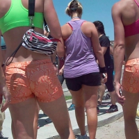 Orange snake skin spandex shorts