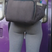 Tattooed chick in leggings
