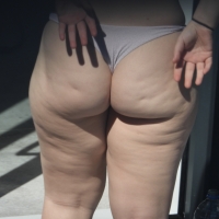 Sexy thick neighbor caught getting some sun in a little bikini showing of her chunky ass DSCN3927.JPG