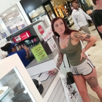 Tattooed redhead babe