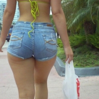 Sexy babe in denim shorts