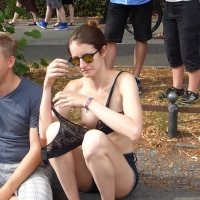 Topless girl being tickled