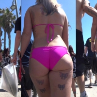 Tattooed bikini babe