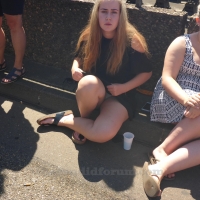 Sexy blonde girl showing her panties while sitting on the ground in a little skirt MJ630_P2240966.jpg