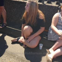 Sexy blonde girl showing her panties while sitting on the ground in a little skirt MJ630_P2240971.jpg
