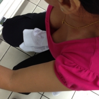 Ethnic girl downbloused while grocery shopping showing some cleavage Ethnic girl downblouse