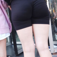 Sexy brunette in biker shorts