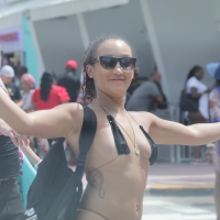 Florida Latina chick in micro thong bikini showing a ton of skin Florida babe in micro thong