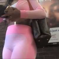 Candid ebony babe with an incredible bubble butt in pink leggings at the train station Screenshot (273).jpg
