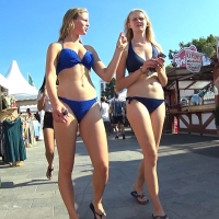 Two girls in blue bikinis