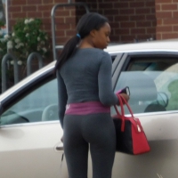Ebony babe getting into her car with a great ass in grey leggings Ebony getting into her car with nice ass