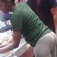 Ebony girl at the convenience store in grey leggings with a nice ass Ebony girl in grey leggings