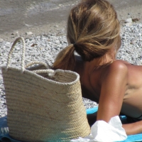 Sexy candid milf with her pussy lips peeking out of her bikini at the beach IMG_2178.JPG.82a7e29acaddfbd58fad0a01deb548b0.jfif