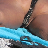 Sexy candid milf with her pussy lips peeking out of her bikini at the beach IMG_2200.JPG.b0ee22a1371a58118198ed133280a309.jfif
