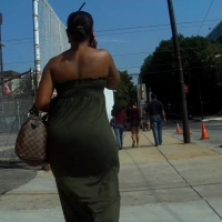 Huge black booty in green dress